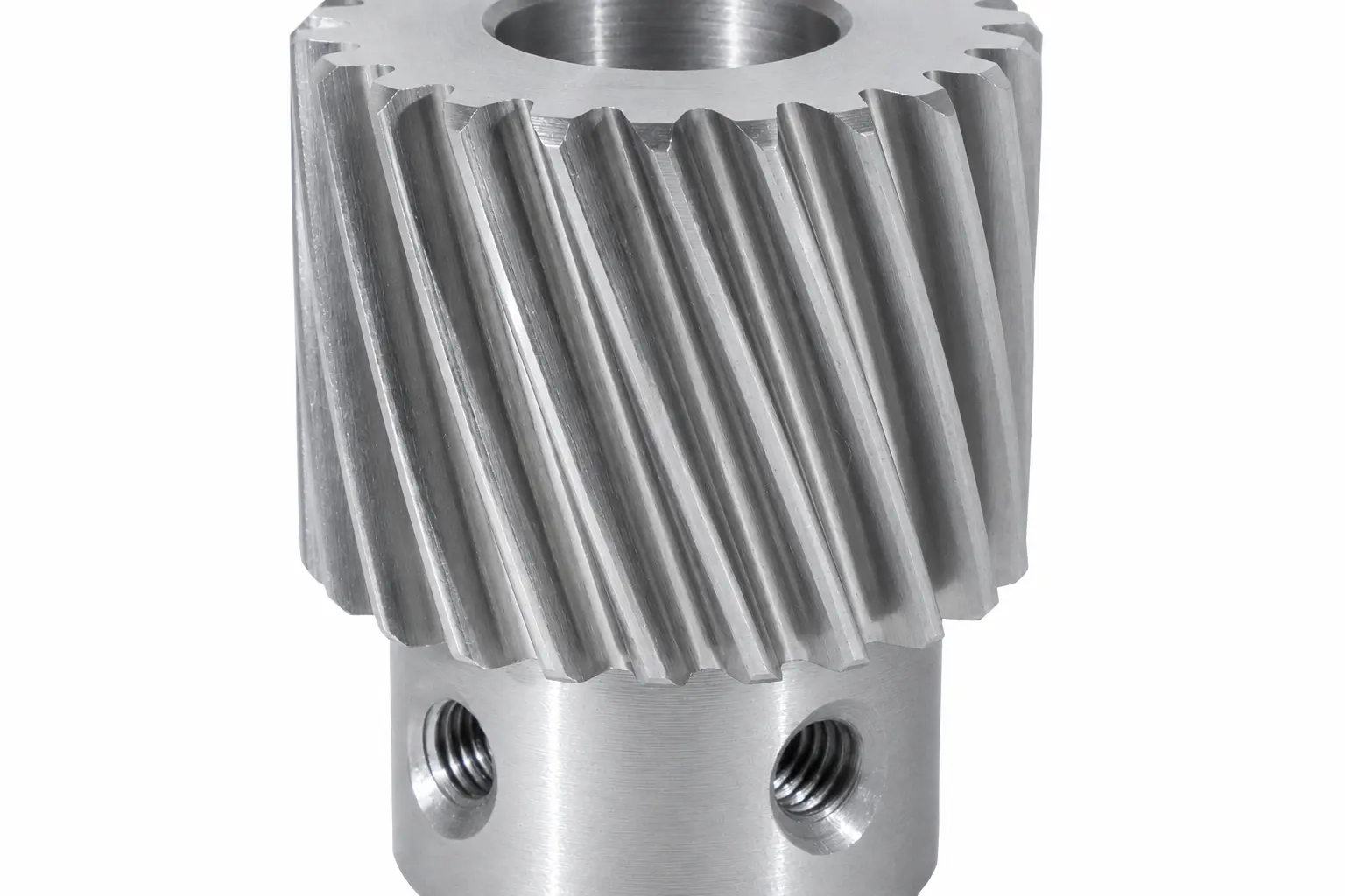 Clean machined steel helical pinion with hub and threaded mounting holes